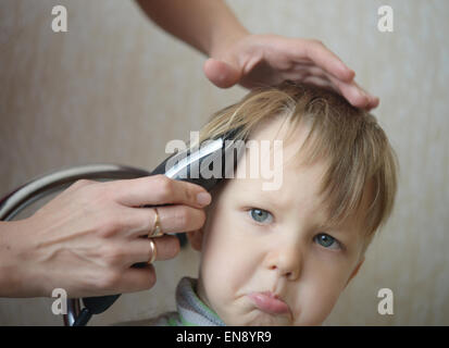 Kind immer seine Frisur Stockfoto