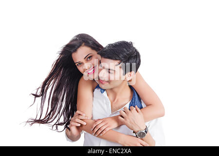 2 indische verheiratet Paare Huckepack genießen Stockfoto