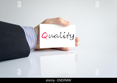 Unternehmensqualität Mann Hand schreiben Stockfoto