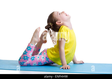 Kind Mädchen gymnastischen Übungen auf Matte isoliert Stockfoto