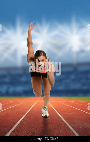 African American Sprint Läufer am Start des Wettbewerbs Stockfoto