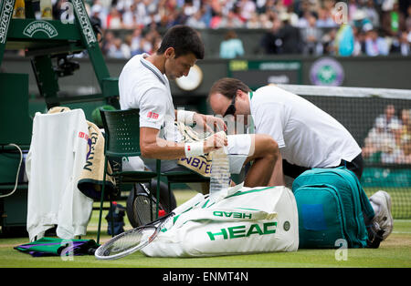 Novak Djolovic während der Mens singles letzte The Meisterschaften Wimbledon 2014 The All England Lawn Tennis & Croquet Club Wimble Stockfoto