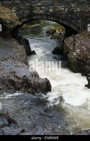 Pont-y-paar Brücke, Fluss Llugwy (Afon Llugwy), Betws-y-Coed, Clwyd, Wales, UK. Stockfoto