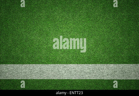 Weiß lackierter Linie auf grünen Rasen Hintergrundtextur Grunge Beleuchtung mit vielen Textfreiraum. Perfekt für Sport-Designs. Stockfoto