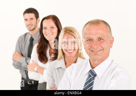 Business Team glücklich stehen in Linie Porträt Stockfoto