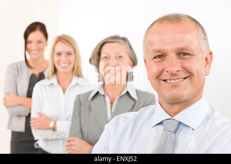 Business Team gerne reifer Mann mit Kollegen Stockfoto