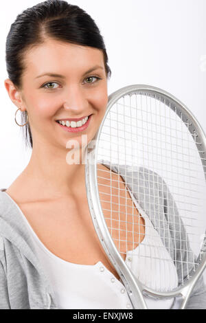 Tennis Spieler Frau jung lächelnd halten Schläger Stockfoto