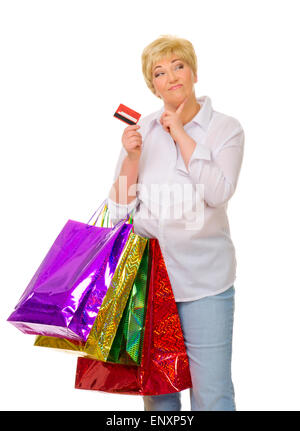 Ältere Frau mit Taschen und Kreditkarte isoliert Stockfoto