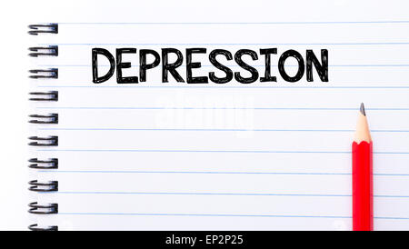 Depression-Text geschrieben am Notizblockseite, roter Buntstift auf der rechten Seite. Konzept-Bild Stockfoto