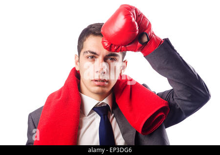 Geschäftsmann mit Boxhandschuhen auf weiß Stockfoto