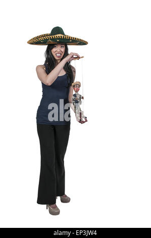 Frau mit Sombrero und Marionette Stockfoto