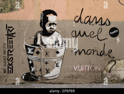 Schwarzes Baby in einen Eimer Vuitton, Graffiti, Rue de l'Echaude, Saint Germain des Pres, Paris, Frankreich Stockfoto