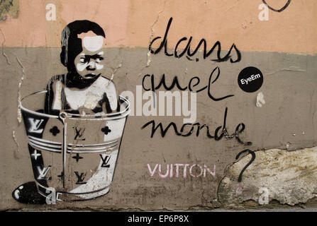 Schwarzes Baby in einen Eimer Vuitton, Graffiti, Rue de l'Echaude, Saint Germain des Pres, Paris, Frankreich Stockfoto