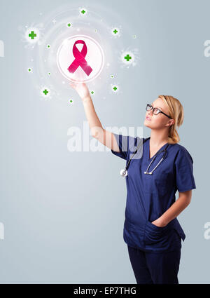 Junge Krankenschwester, die moderne medizinische Art der Knöpfe drücken Stockfoto