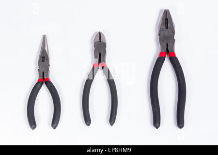 Drei Zangen isoliert auf weiss Stockfoto