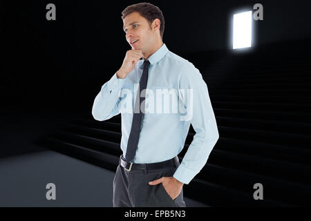 Zusammengesetztes Bild des nachdenklichen Geschäftsmann mit Hand am Kinn Stockfoto