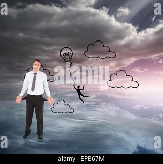 Zusammengesetztes Bild der Geschäftsmann mit leeren Taschen Stockfoto