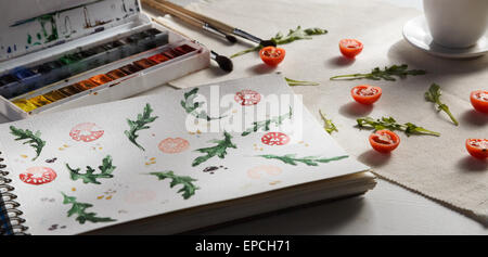 Cherry-Tomaten und Rucola Stockfoto