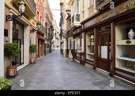 Ruhigen Calle Alvarez Quintero Seitenstraße mit Hotels und Geschäften in Sevilla Spanien Stockfoto