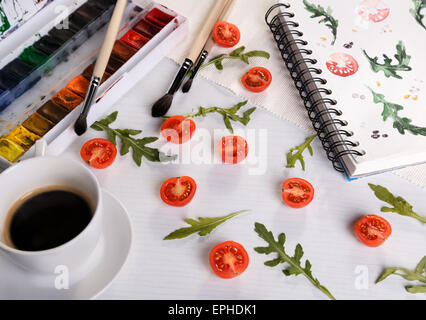 Cherry-Tomaten und Rucola Stockfoto