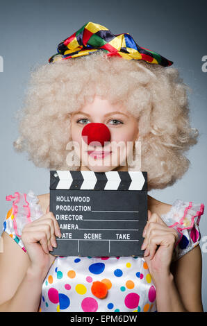 Clown mit Film-Klappe Stockfoto