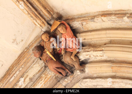 Misericord, dekoratives Gesicht an hohen Decken, hohe Kirche, Norwich Cathedral, Norfolk, Großbritannien Stockfoto