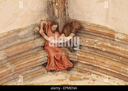 Misericord, dekoratives Gesicht an hohen Decken, hohe Kirche, Norwich Cathedral, Norfolk, Großbritannien Stockfoto