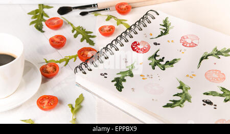 Cherry-Tomaten und Rucola Stockfoto