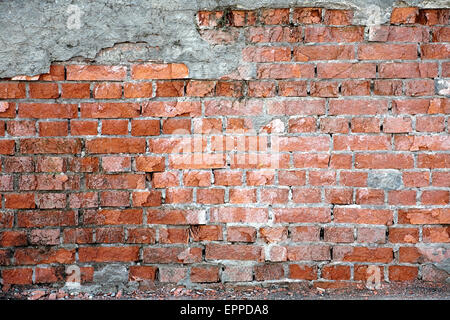 alte beschädigte rote Ziegel Wand Muster Hintergrunddetails closeup Stockfoto