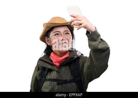 Junge weibliche Bergsteiger machen Selfie auf smartphone Stockfoto
