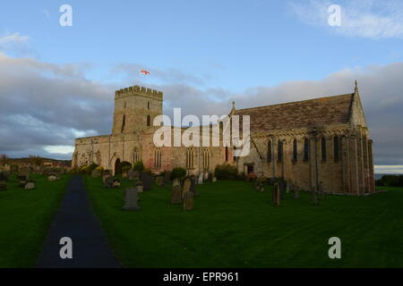 Str. Aidans Kirche Bamburgh in der frühen Morgensonne Stockfoto