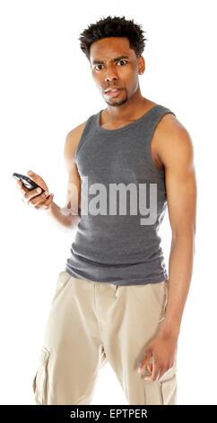 Attraktive afro-amerikanischer Mann posiert in einem Studio auf einem Hintergrund isoliert Stockfoto