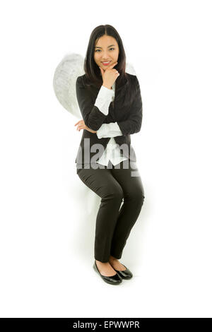 Attraktive asiatische junge Frau Engel und Dämon Stockfoto