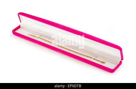 Gold-Armband in rosa Feld auf weißem Hintergrund Stockfoto