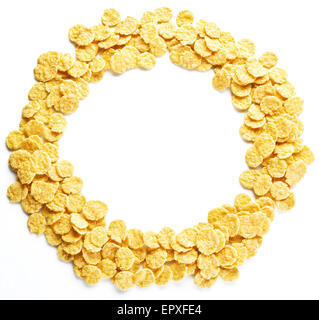 Cornflakes Runden auf einem weißen Hintergrund. Stockfoto