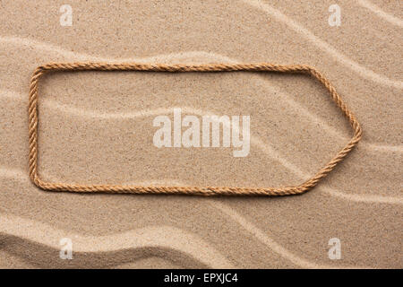 Zeiger des Seils auf dem Sand, mit Platz für Ihren Text gemacht Stockfoto