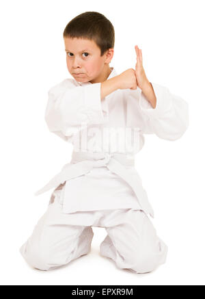 Junge im weißen Kimono posiert Stockfoto
