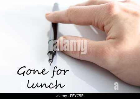 Stift in der Hand isoliert auf weißem Hintergrund Gone für Mittagessen-Konzept Stockfoto