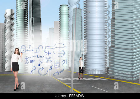 Business-Frau zeichnen ein Symbole Stockfoto