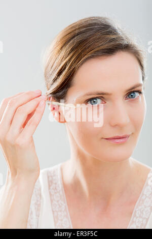 Frau mit Serum Augenpartie. Stockfoto