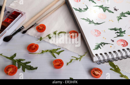 Cherry-Tomaten und Rucola Stockfoto