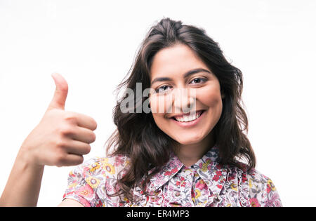 Glückliche junge Frau Daumen auftauchend isoliert auf weißem Hintergrund. Blick in die Kamera Stockfoto