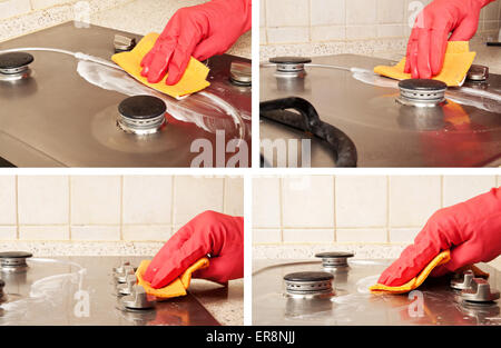Mann Heand mit roten Handschuh Reinigung schmutziger Gasherd Stockfoto
