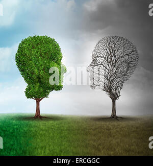 Menschlichen Stimmung und Emotionen Störung Konzept als Baum geformt wie zwei menschliche Gesichter mit halb voller Blätter und die gegenüberliegende Seite leer Zweige als medizinische Metapher für psychologische Kontrast in Gefühlen. Stockfoto