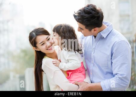 Glückliche junge Familie Stockfoto