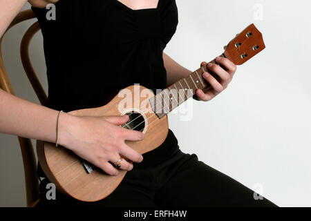 Ukulele in Spielposition Stockfoto