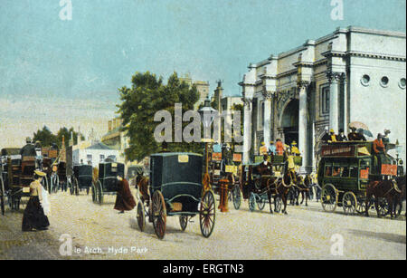 London - Marble Arch, Hydepark mit Pferd gezogenen Straßenbahnen und Wagen frühen 1900er Jahren. Fußgänger. Laternenpfahl Stockfoto