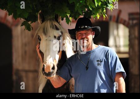 Mensch und Pferd Stockfoto