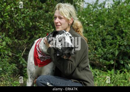 Frau mit Dogge Stockfoto