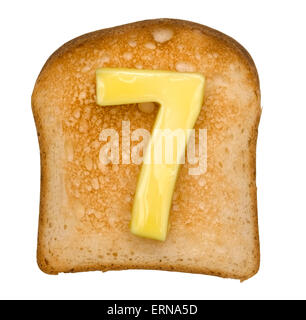 Isolierte Toast mit Butter Nummer 7 Stockfoto